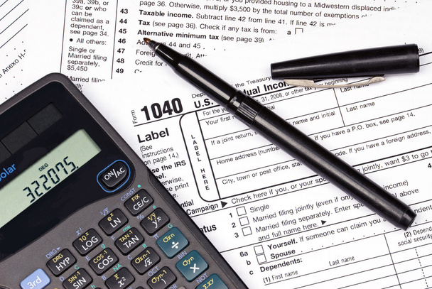 Tax forms, calculator and pen - Fotó, kép