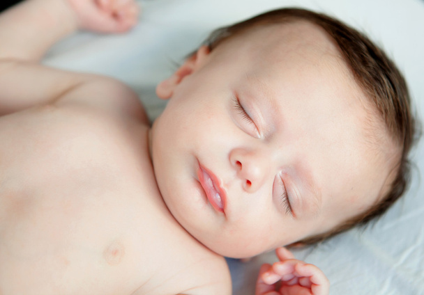 Infant baby sleeping in crib - Фото, зображення