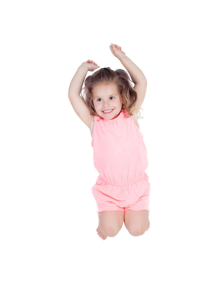Happy little girl jumping - Foto, afbeelding