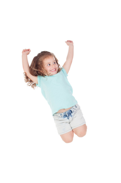 Счастливая маленькая девочка прыгает
 - Фото, изображение