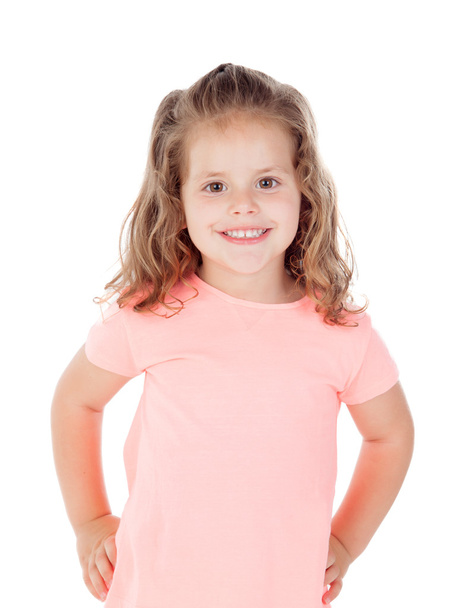 Cute little girl with crossed arms smiling - Foto, imagen