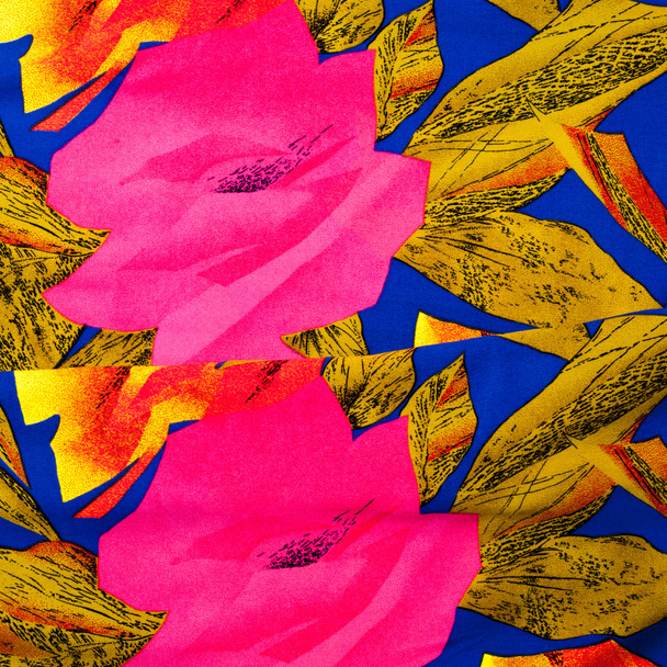 The texture of the silk fabric, red and yellow flowers on a blue background - Photo, Image