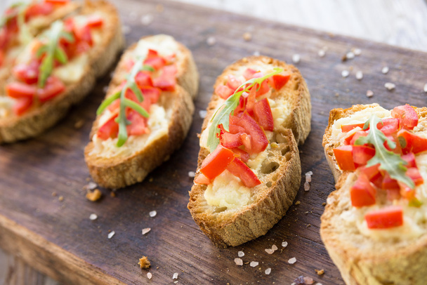 Italian bruschette with tomato and cheese - Photo, Image