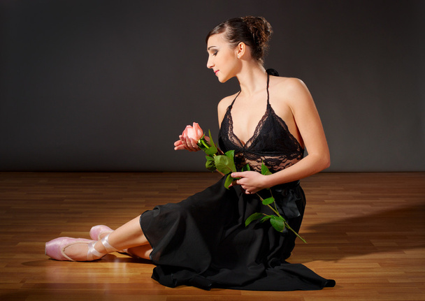 Young ballerina with flower - Фото, зображення