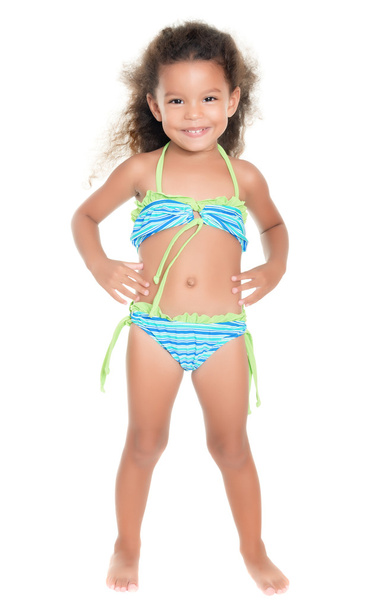 Cute small hispanic girl wearing a swimsuit - Photo, Image