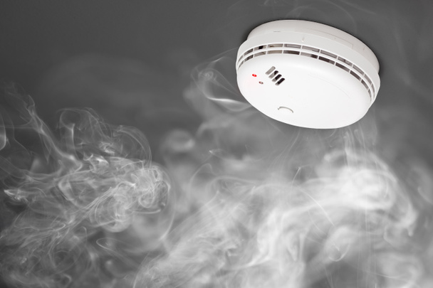 smoke detector of fire alarm in action - Photo, Image