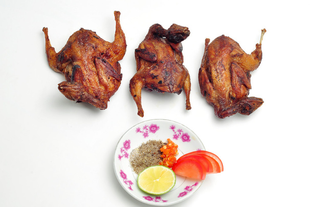 Vietnamese grilled quail on a white background - Photo, Image