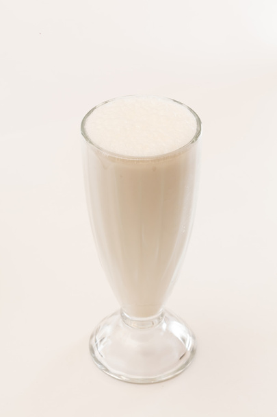 milk cocktail in glass on white - Фото, зображення