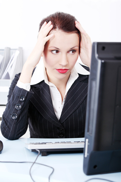Pretty businesswoman having headache. - Photo, Image