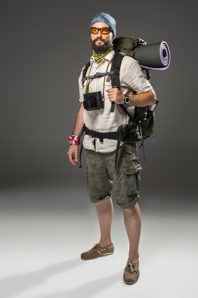 Full length portrait of a male fully equipped tourist  - Zdjęcie, obraz