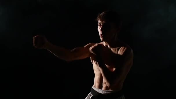 Karate man doing exercises - Metraje, vídeo