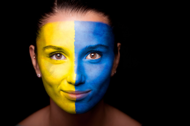 Portrait of a woman with the flag of the Ukraine - Fotó, kép
