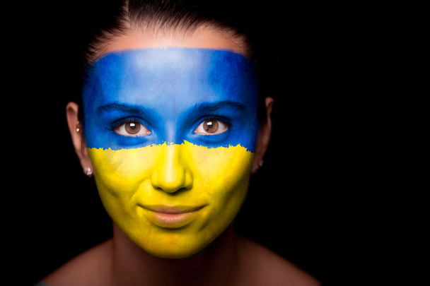 Portrait of a woman with the flag of the Ukraine - Valokuva, kuva