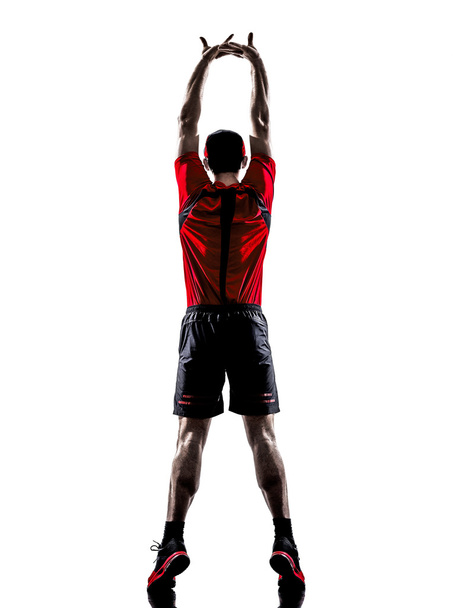ウォーミング アップ シルエット ストレッチ男性ランナー ジョガー - 写真・画像