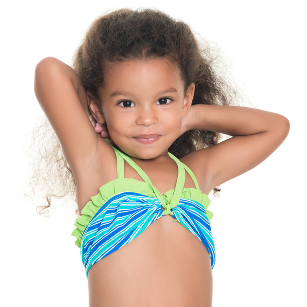 Cute small hispanic girl wearing a swimsuit - Fotoğraf, Görsel