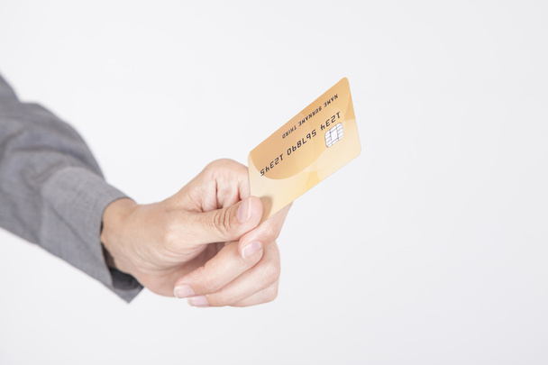 kredi kartı beyaz arka plan sunan - Fotoğraf, Görsel
