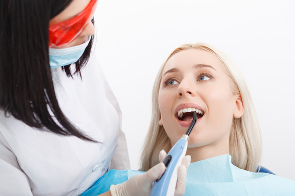 Woman during her dentist visit - Foto, immagini