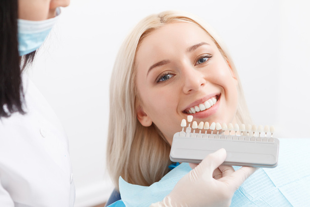 woman by dentist and doctor matching filling - Photo, Image