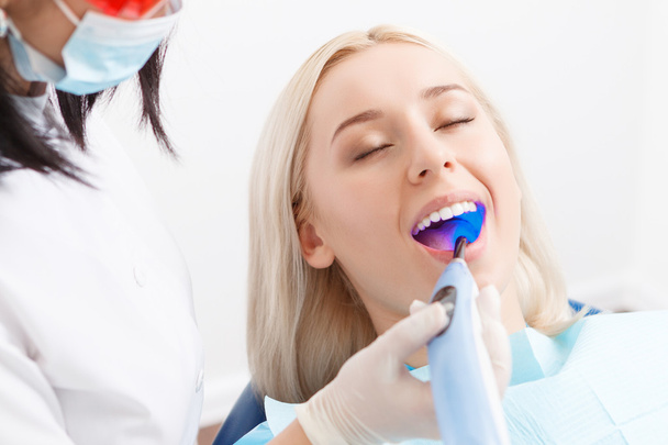Woman during her dentist visit - Φωτογραφία, εικόνα