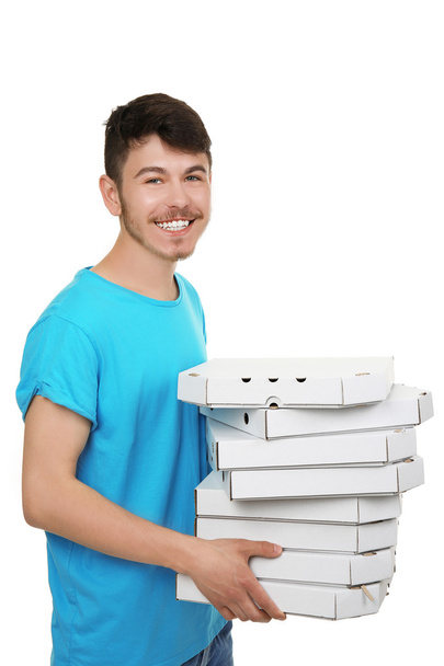 Delivery boy with cardboard pizza box isolated on white - Fotoğraf, Görsel