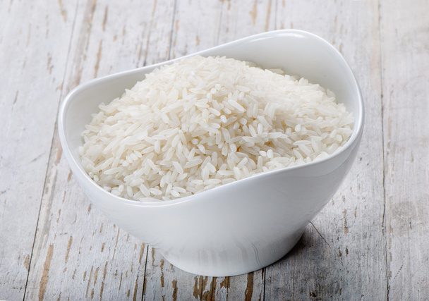 Rice on a wooden table - Foto, immagini