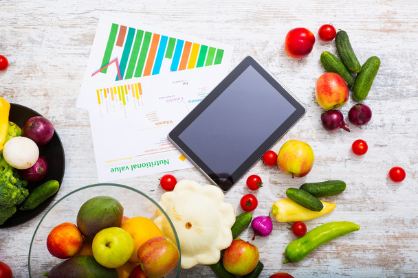 Healthy nutrition and tablet - Photo, image