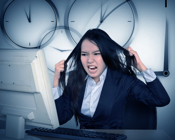 Asian business get angry because overtime work - 写真・画像