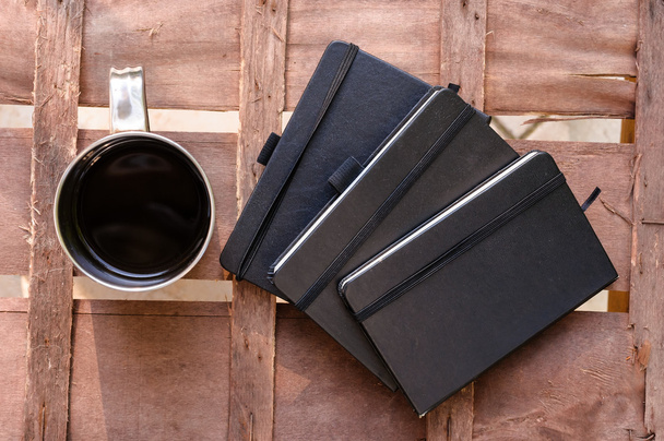 cup of coffee with notepads - Fotoğraf, Görsel