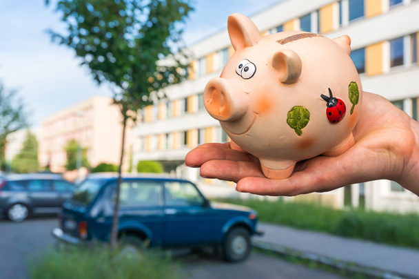 All savings money from pink ceramic piggy bank to pay for the dr - 写真・画像