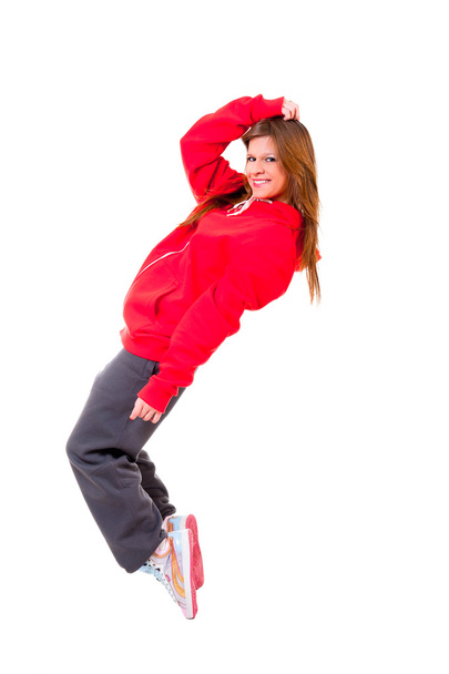 Тонкая атлетичная девушка, танцующая хип-хоп
 - Фото, изображение