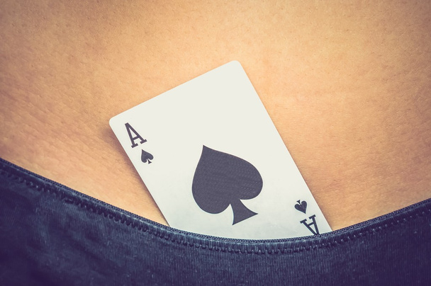 Female sexy body with spades ace card in their panties - Fotografie, Obrázek