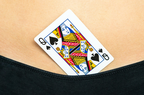 Female sexy body with spades queen card in panties  - 写真・画像