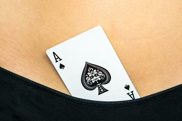 Female sexy body with spades ace card in panties  - Foto, afbeelding