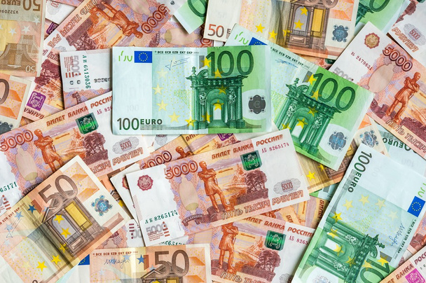 Russian and Euro banknotes background - Fotó, kép