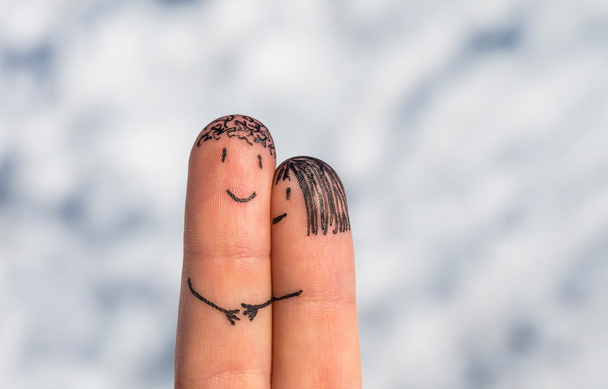 Happy fingers on a snow background - Foto, afbeelding