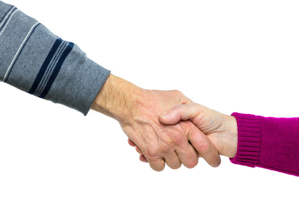 Muž a žena vzájemně dávat handshake - Fotografie, Obrázek