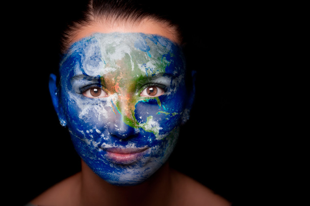 Girl with a painted map of World on his face. - Foto, immagini