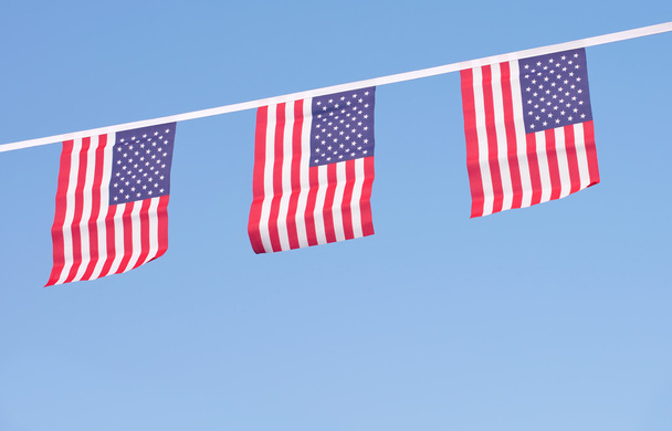 USA flags hanging prowdly for July 4 Independance Day - 写真・画像