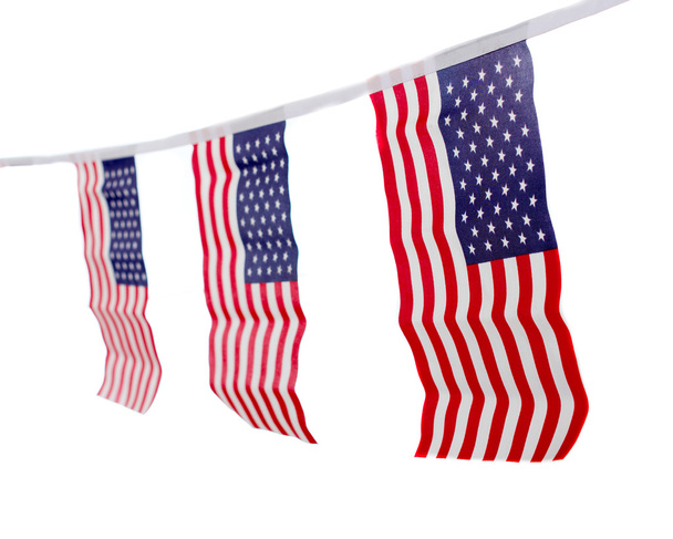 Bandeiras dos EUA penduradas orgulhosamente para 4 de julho Dia da Independência
 - Foto, Imagem