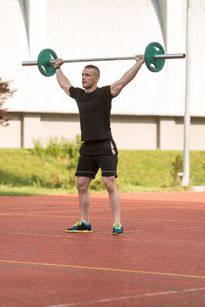 Young Man Doing A Overhead Squat Exercise Outdoor - Zdjęcie, obraz