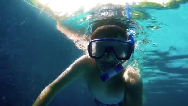Tennager snorkeling in home swimming pool - Footage, Video