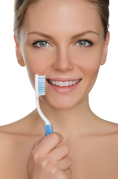 Beautiful woman with toothbrush in mouth - Fotoğraf, Görsel