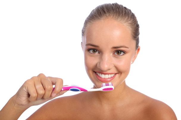 Cleaning teeth with toothbrush for happy girl - Foto, imagen