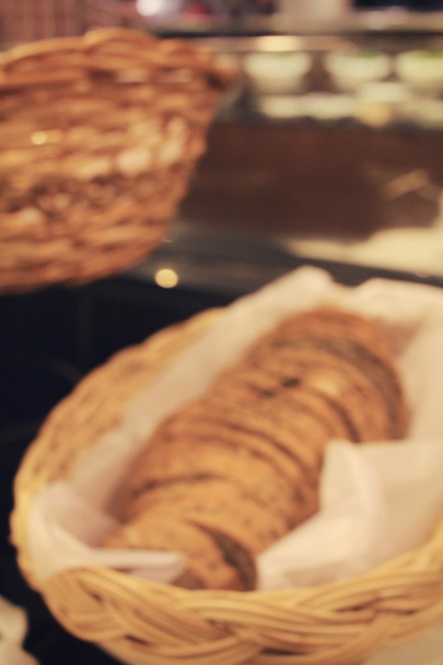 desdibujado de pan fresco en la panadería
 - Foto, imagen