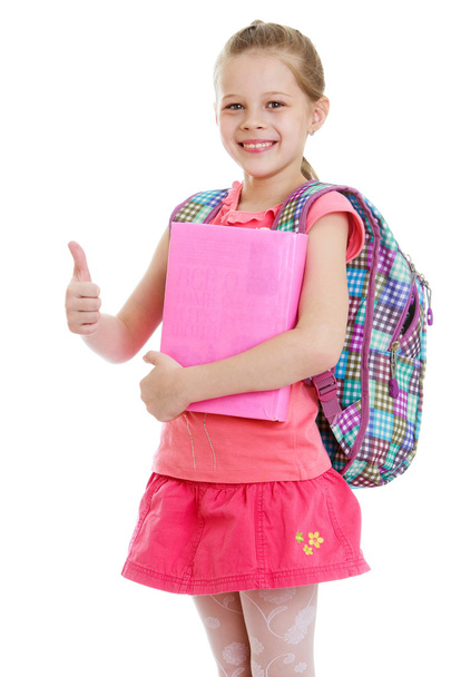 Girl schoolgirl book in hand  - Фото, изображение