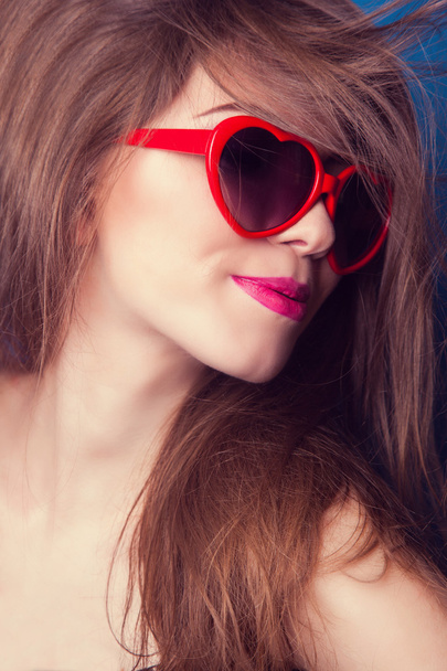 Woman with red sunglasses - 写真・画像