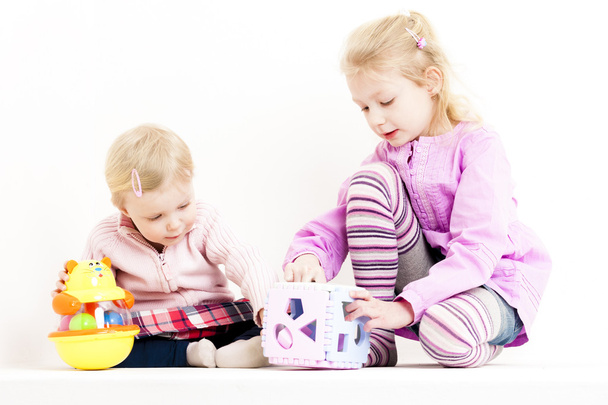playing two little girls - Foto, immagini