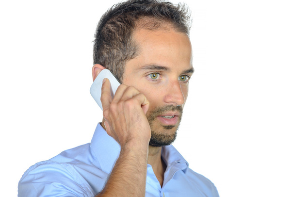 portrait of a young businessman on phone  - 写真・画像