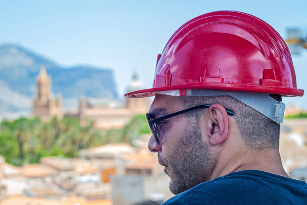 worker with safety helmet in Palermo - Zdjęcie, obraz