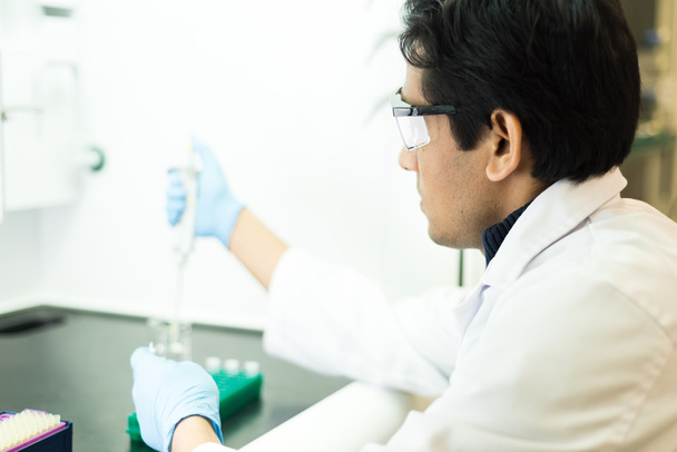 Researcher working with a Pipette - Photo, Image